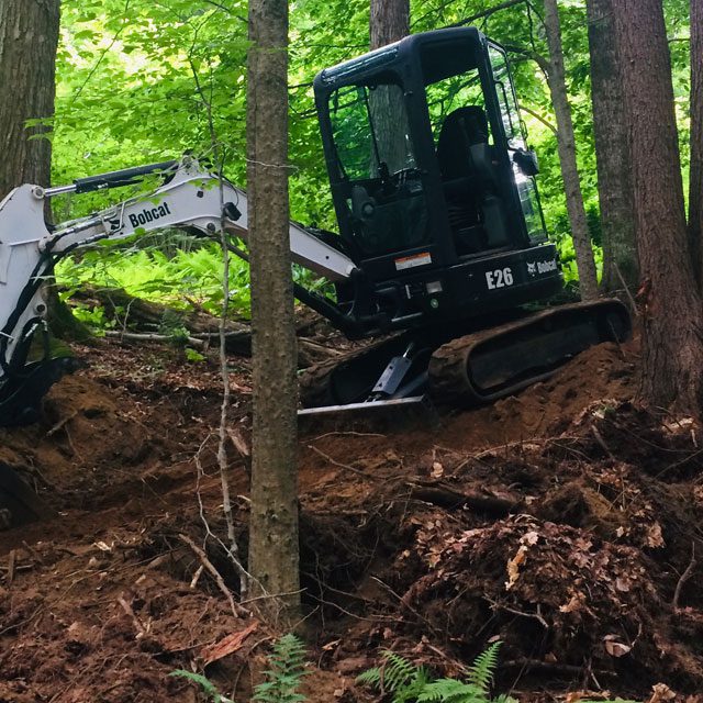 Excavator in action building tabletop